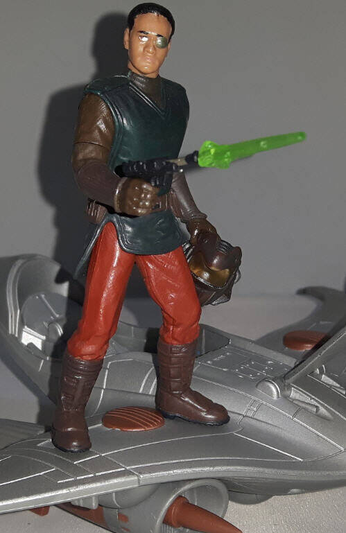 Captain Typho figure with green blaster fire
