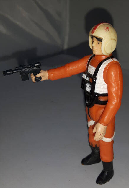 Luke Skywalker X-Wing Pilot Figure with blaster side view